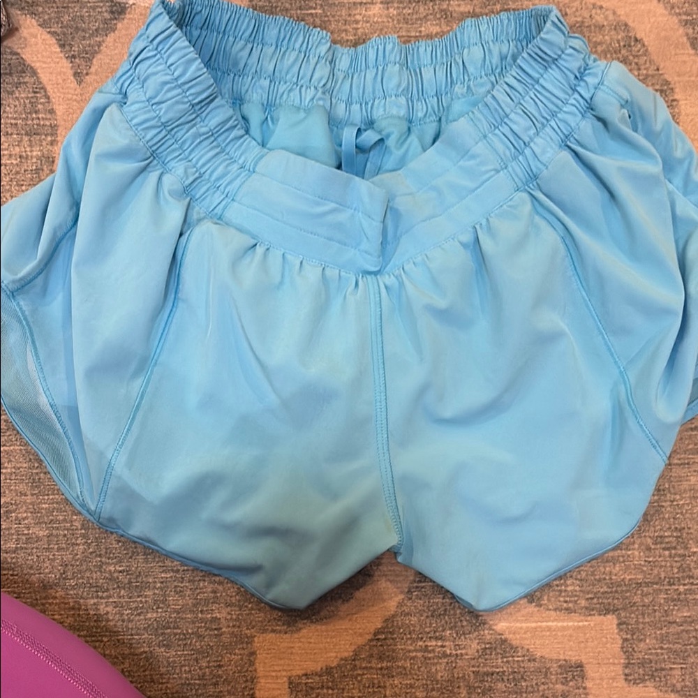 Sky Blue Athletic Shorts with Elastic Waistband and Pleated Design